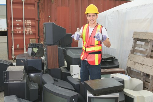 House clearance team removing furniture in Chigwell