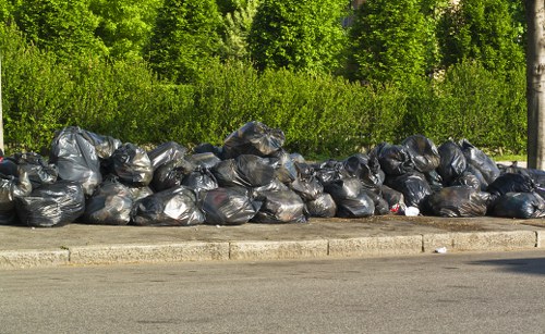 Professional waste management team handling business waste